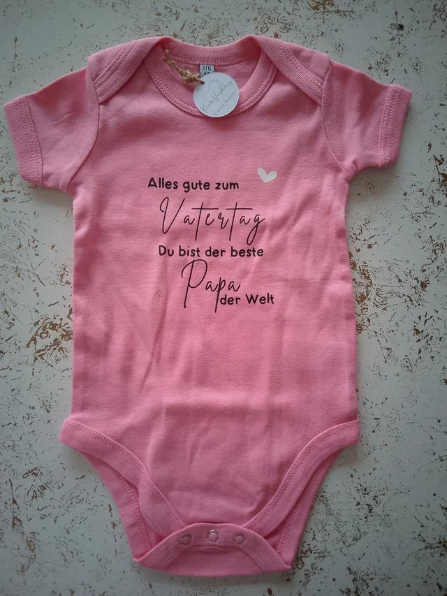 Vatertags-Babybody „Bester Papa der Welt“ in Rosa | KreativVeredelung